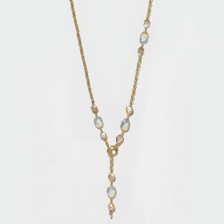 IRIS gold moonstone and pearl rolo chain necklace shown in its long lariat arrangement.