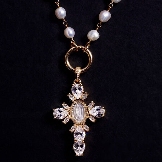 Gold Pearl Cross Necklace with freshwater pearls and crystal cross pendant on a black background.