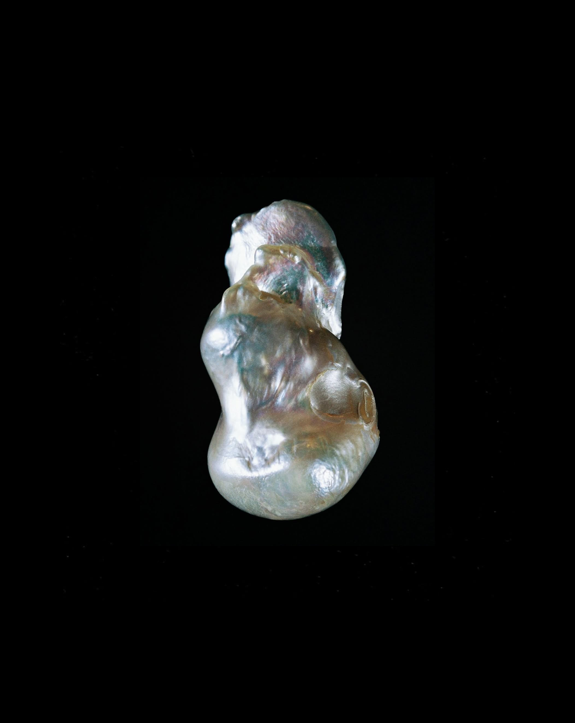 Irregular baroque freshwater pearls against black