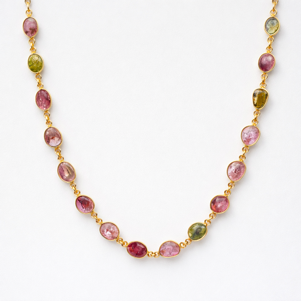 Necklace with multicolored gemstones on a white background